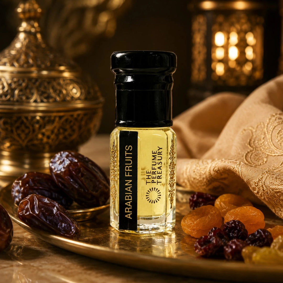 Luxury lifestyle composition of Arabian Fruits attar perfume bottle surrounded by dates, dried fruits, golden décor and embroidered fabric in a warm Arabian-inspired fragrance setting.