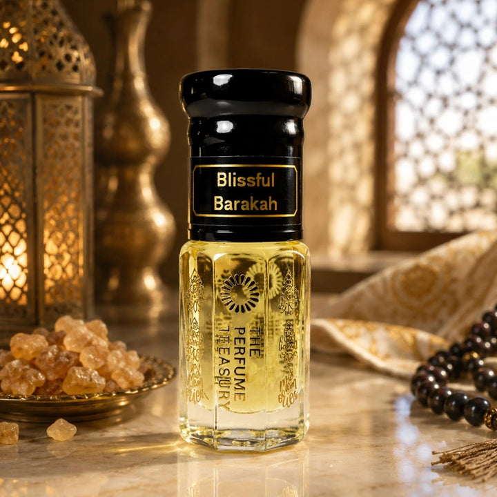 Premium oriental-inspired lifestyle image of Blissful Barakah perfume oil bottle displayed with incense resin, prayer beads and ornate lantern decor in a warm golden setting that conveys spiritual luxury and elegance.