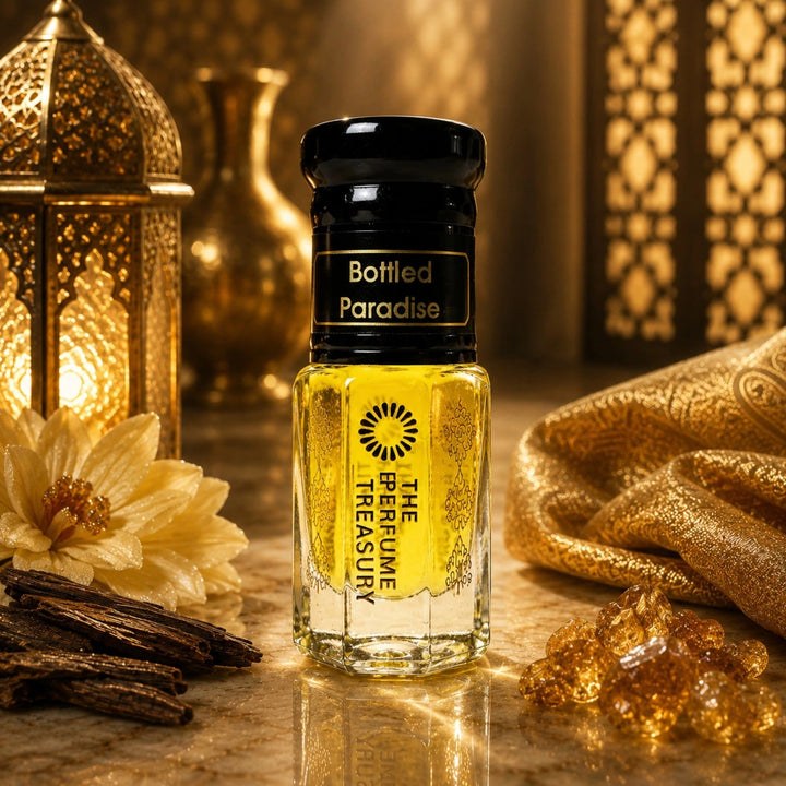 Bottled Paradise attar perfume oil by The Perfume Treasury displayed in a warm Arabian-inspired luxury setting with oud wood, lanterns and golden accents.