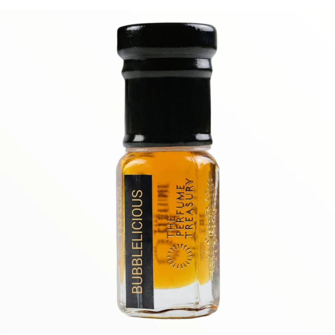 Bubblelicious attar perfume oil bottle with bright amber fragrance oil in luxury mini glass bottle by The Perfume Treasury.