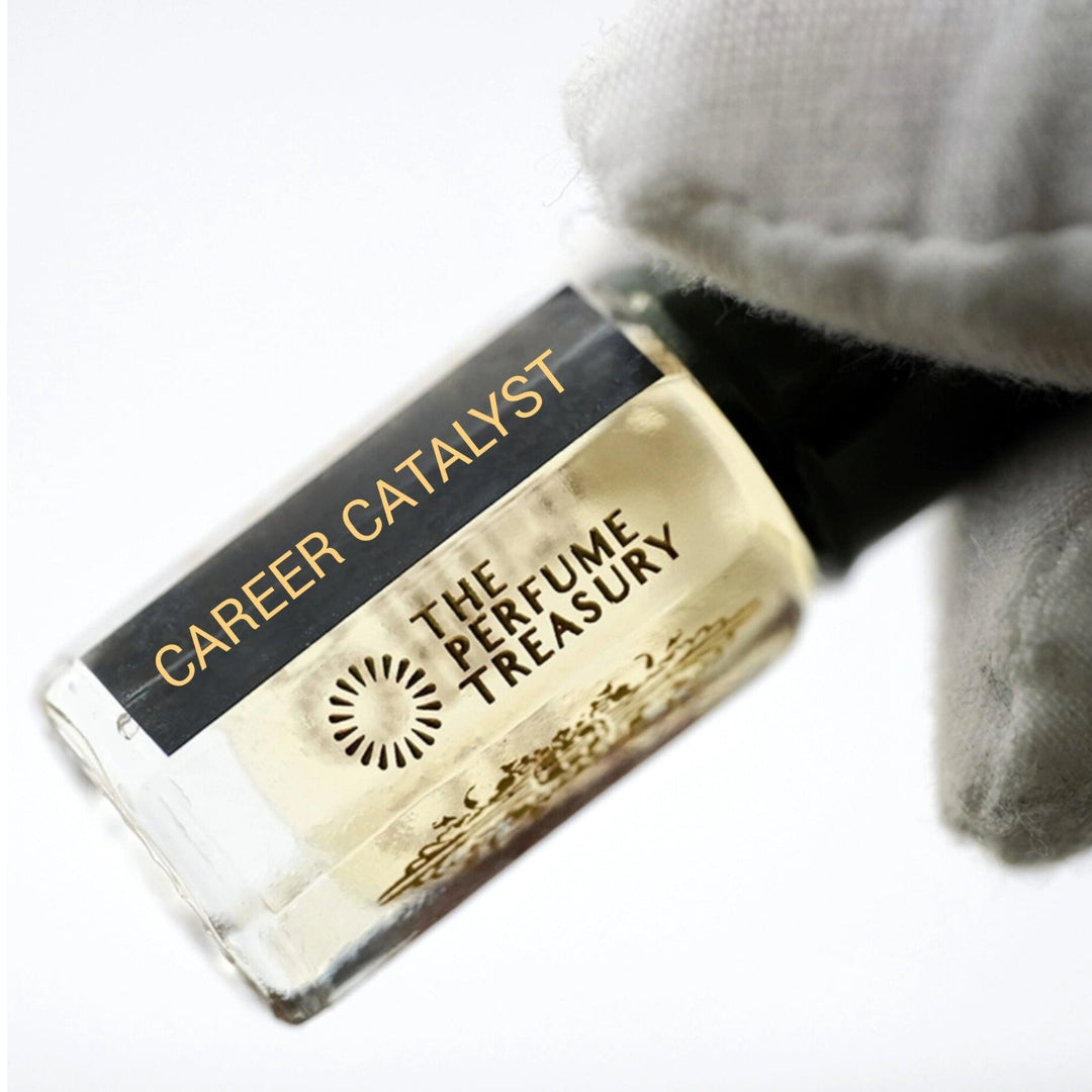 Close-up of Career Catalyst Perfume Oil (3ml) by The Perfume Treasury held in hand, showcasing the concentrated fragrance oil and premium branded glass bottle inspired by Office for Men.