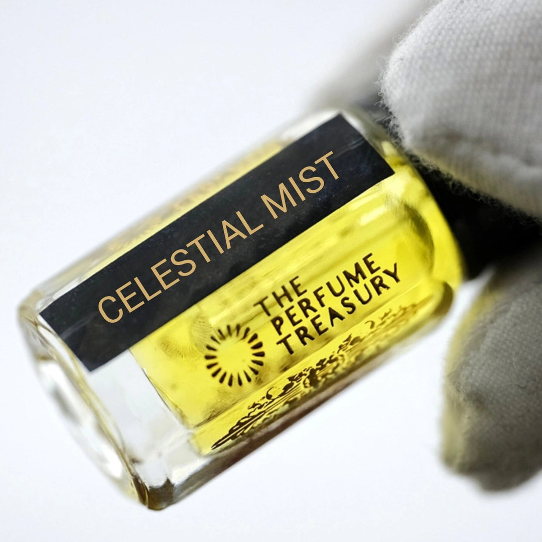 Close-up of Celestial Mist perfume oil bottle held in white glove, highlighting radiant fresh concentrated fragrance oil.