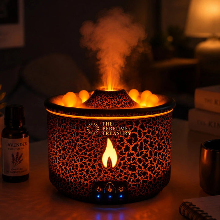 Cozy nighttime lifestyle image of a volcano ultrasonic aroma diffuser with glowing orange flame mist effect releasing soothing vapor beside lavender essential oil in a warm ambient living room setting.