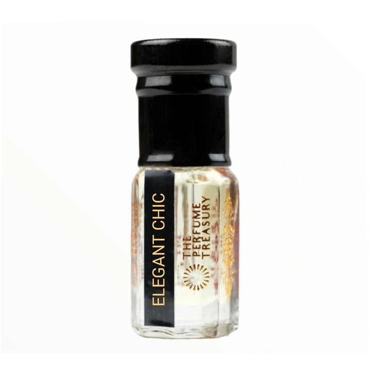 Elegant Chic attar perfume oil by The Perfume Treasury in a clear glass bottle with black cap and gold detailing, displayed on a white background as a premium alcohol-free fragrance oil product image.