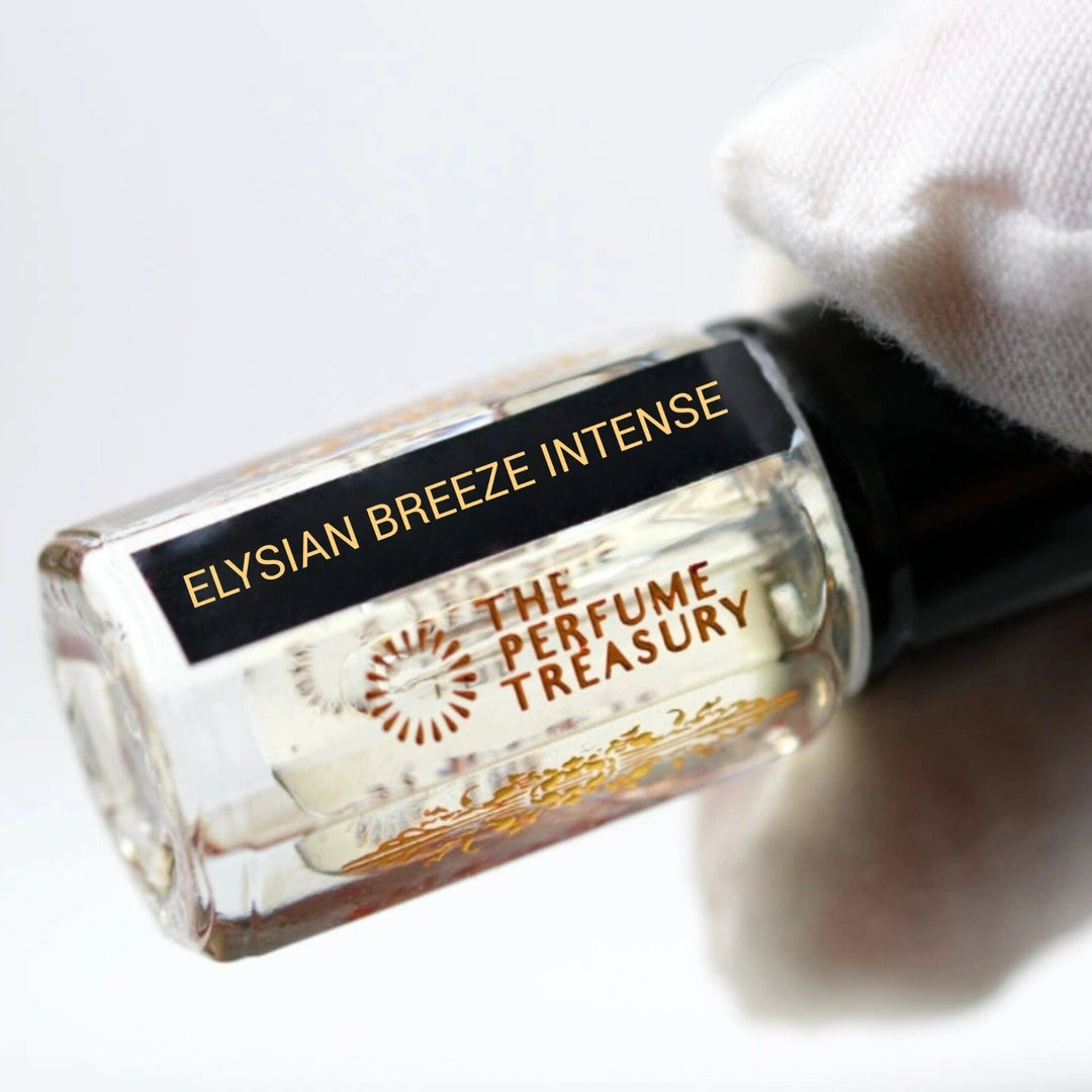 Premium angled view of Elysian Breeze Intense attar perfume oil by The Perfume Treasury held with a white glove, showcasing the elegant bottle and alcohol-free perfume oil craftsmanship.