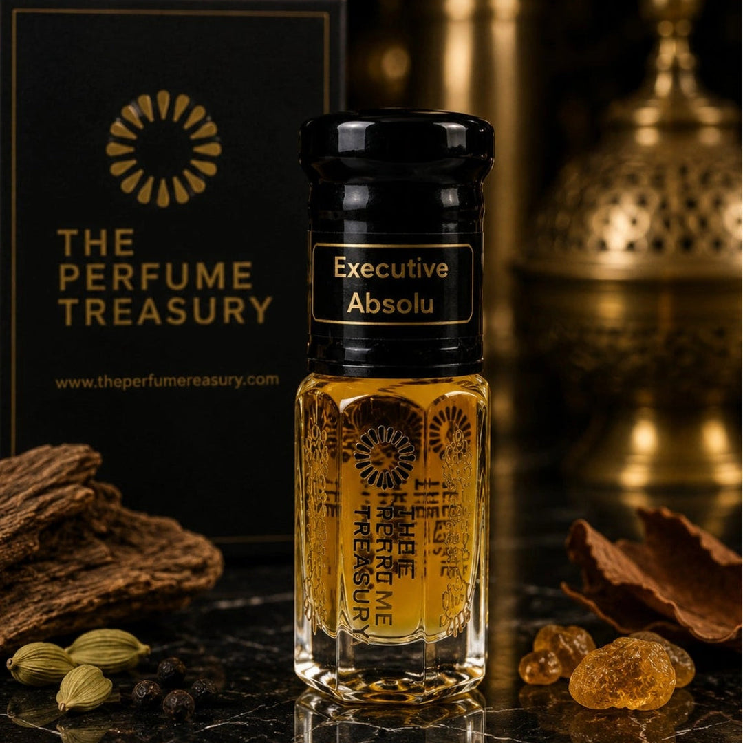Executive Absolu attar perfume oil by The Perfume Treasury displayed in a luxurious dark setting with warm golden tones, woods, spices and resins.