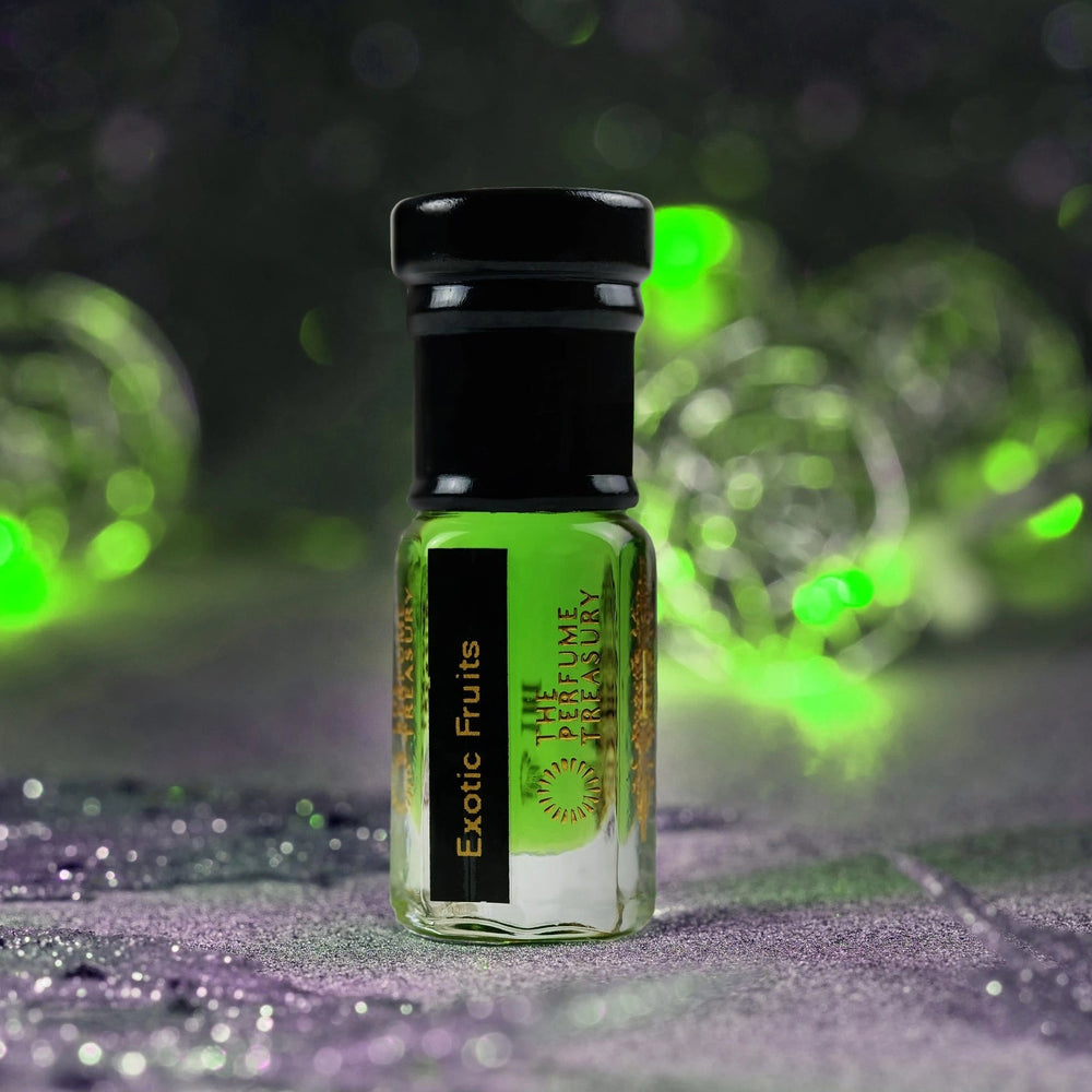 Exotic Fruits attar perfume oil by The Perfume Treasury displayed in a vibrant tropical green setting with luminous bokeh, highlighting the bright green fragrance oil and luxury glass bottle.