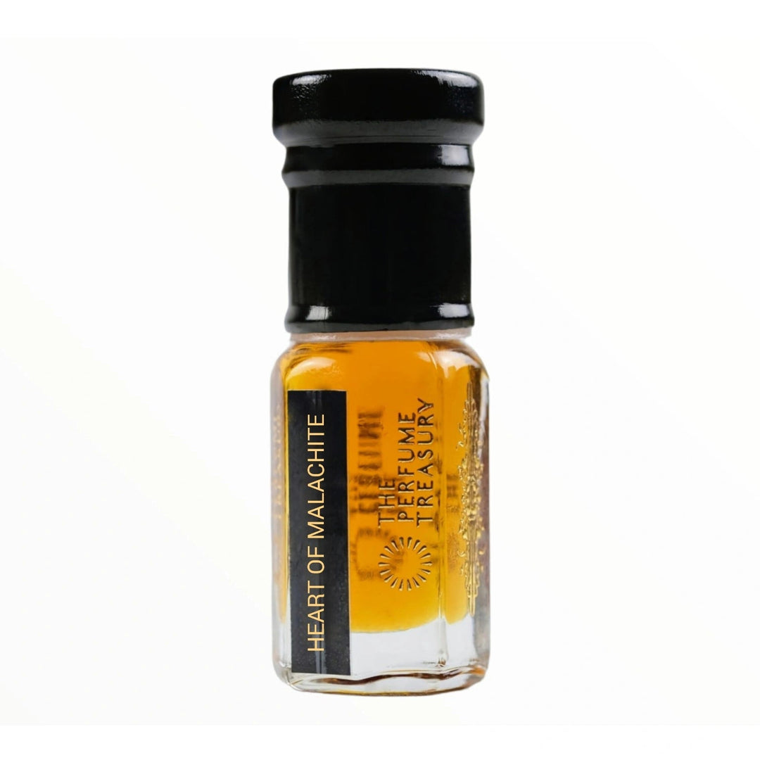 Small perfume bottle with black cap, Heart of Malachite Attar Perfume Oil by The Perfume Treasury, 3ml attar format on a clean white background.