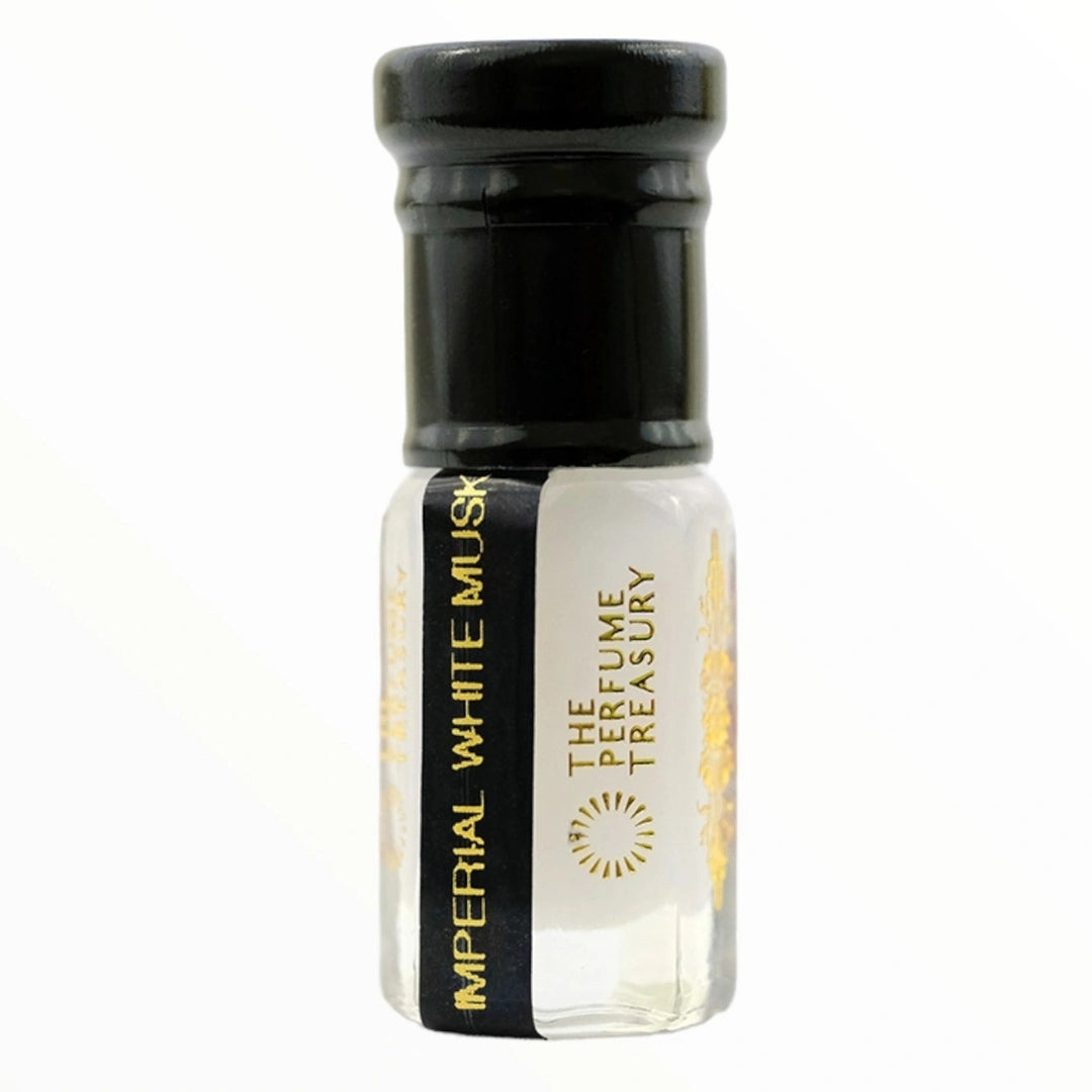 Small clear glass perfume oil bottle with black cap, Imperial White Musk 3ml attar perfume oil by The Perfume Treasury, clear clean soft fragrance oil on white background.