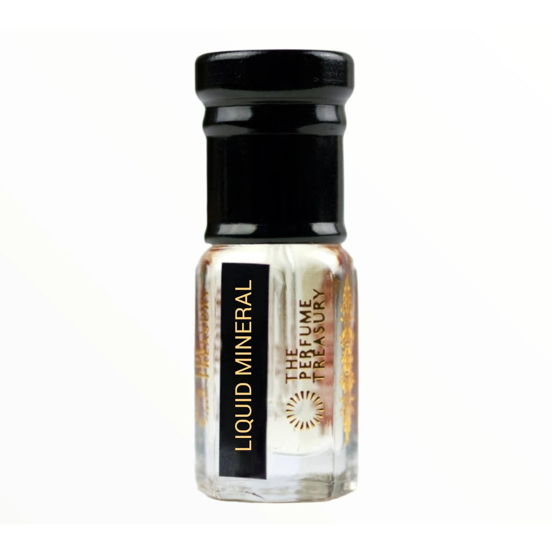Liquid Mineral perfume oil by The Perfume Treasury in a clear glass attar bottle with black cap and label.