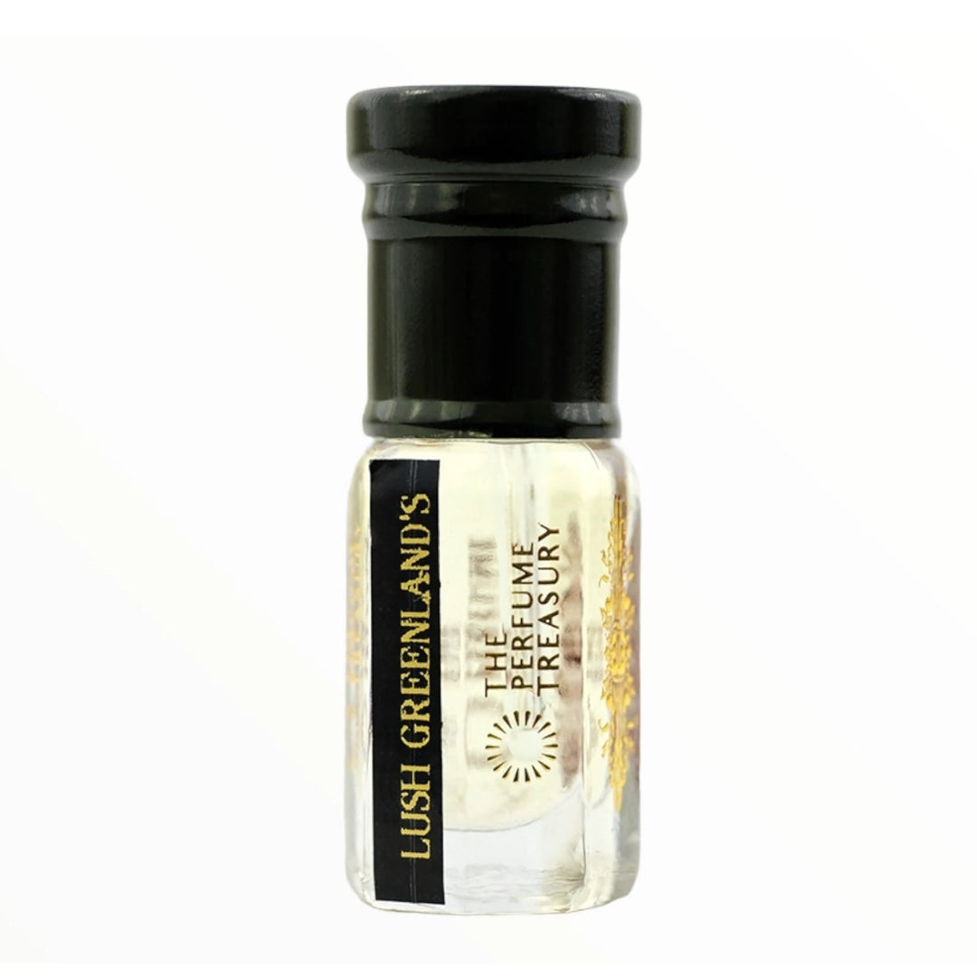 Lush Greenlands perfume oil by The Perfume Treasury in a clear glass attar bottle with black cap and label.