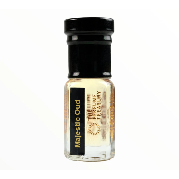 Majestic Oud perfume oil by The Perfume Treasury in a clear glass attar bottle with black cap and black and gold label.