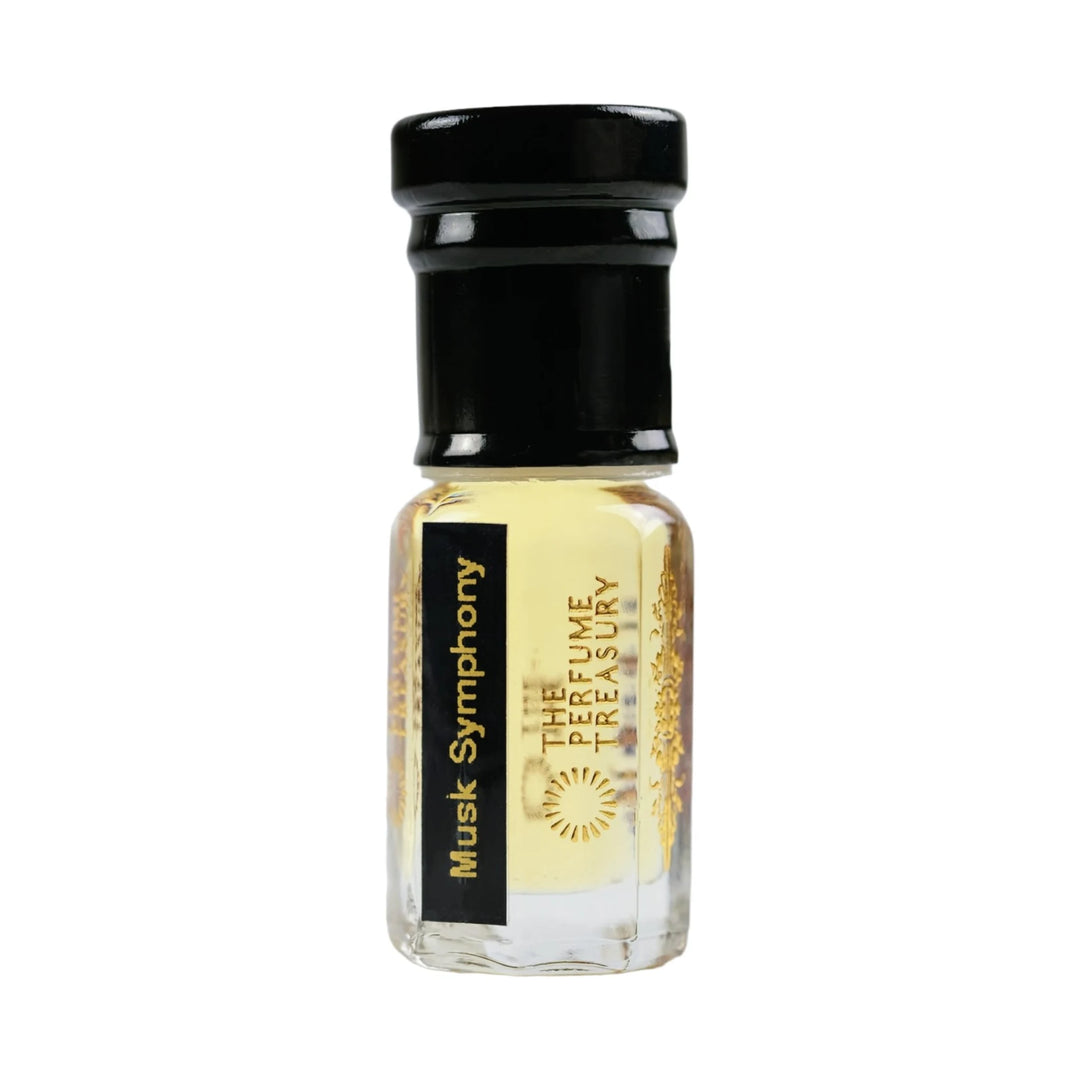 Musk Symphony perfume oil by The Perfume Treasury in a clear glass attar bottle with black cap and golden fragrance oil.