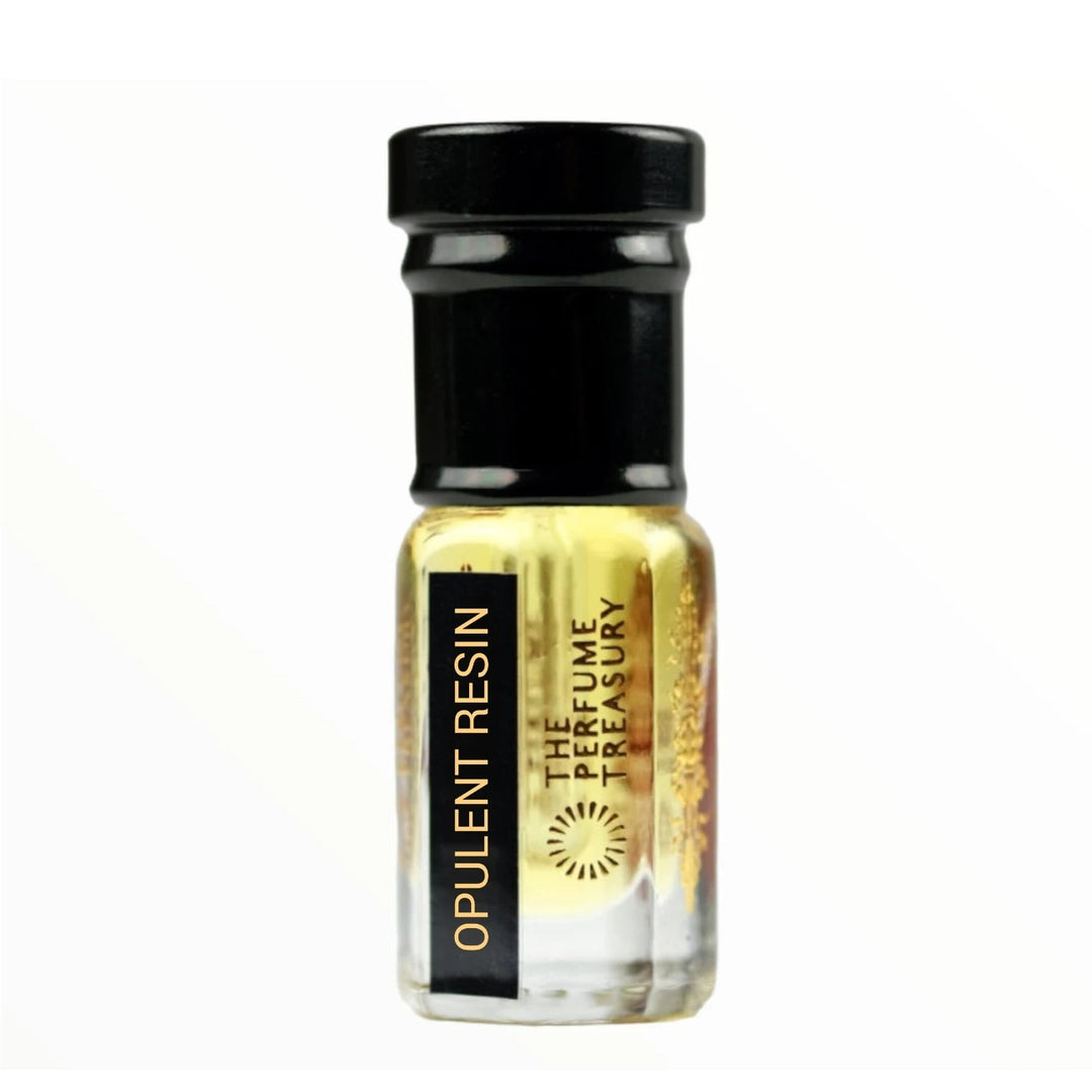 Opulent Resin perfume oil by The Perfume Treasury in a clear glass attar bottle with black cap and golden fragrance oil.