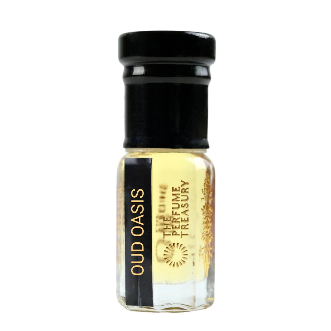 Oud Oasis perfume oil by The Perfume Treasury in a clear glass bottle with black cap and pale golden fragrance oil.
