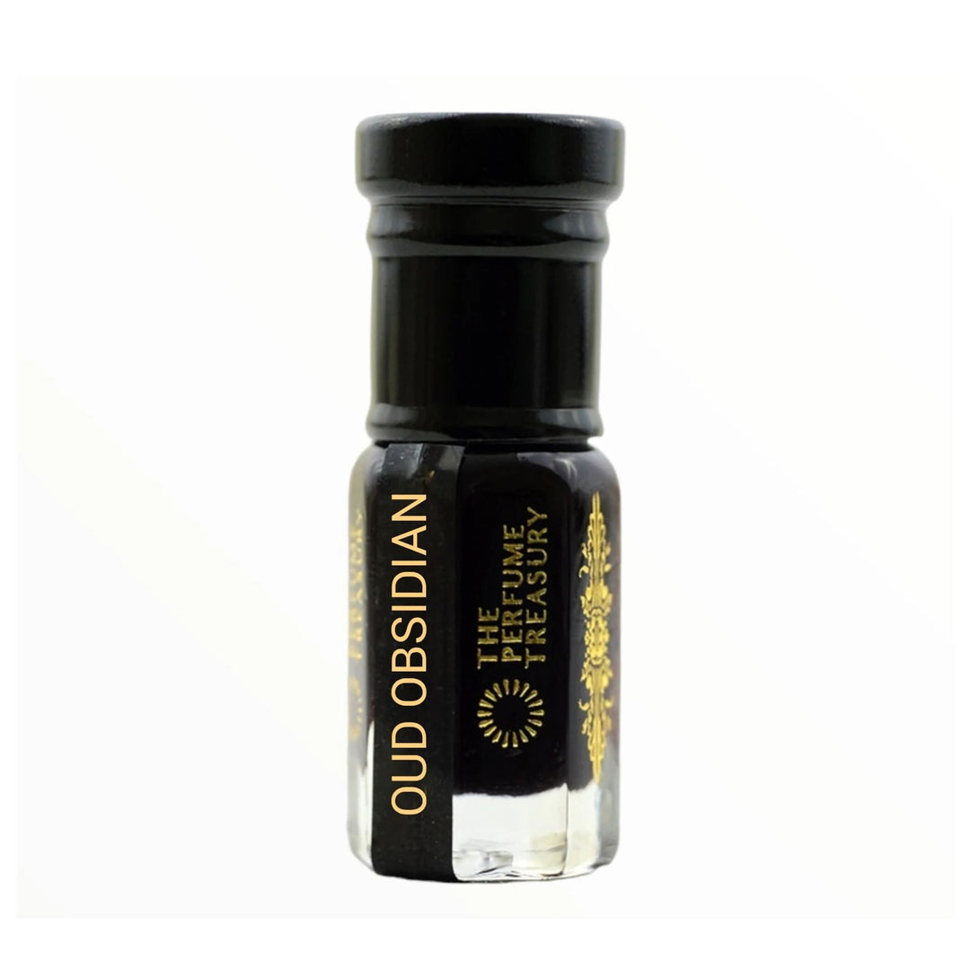 Oud Obsidian perfume oil by The Perfume Treasury in a clear glass bottle with black cap and deep dark fragrance oil.