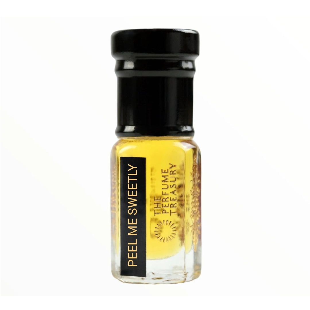 Peel Me Sweetly perfume oil by The Perfume Treasury in a clear glass bottle with black cap and golden fragrance oil.