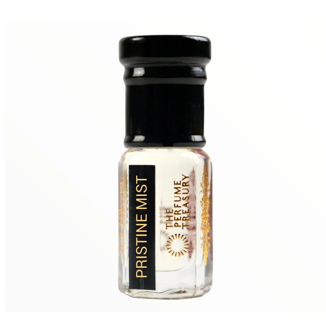 Pristine Mist perfume oil by The Perfume Treasury in a clear glass bottle with black cap and pale fragrance oil.
