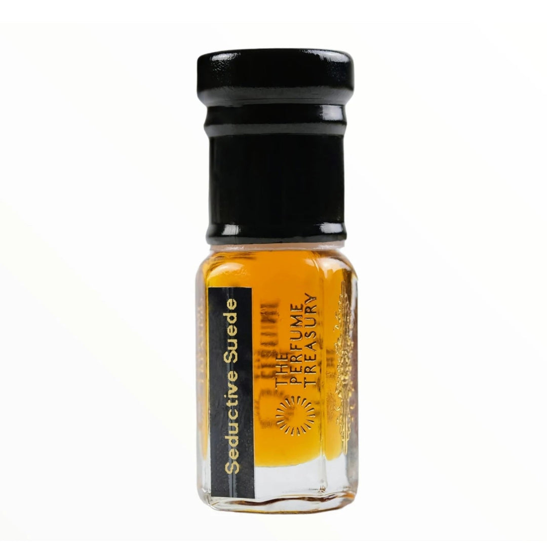 Seductive Suede perfume oil by The Perfume Treasury in a clear glass bottle with black cap and rich amber fragrance oil.