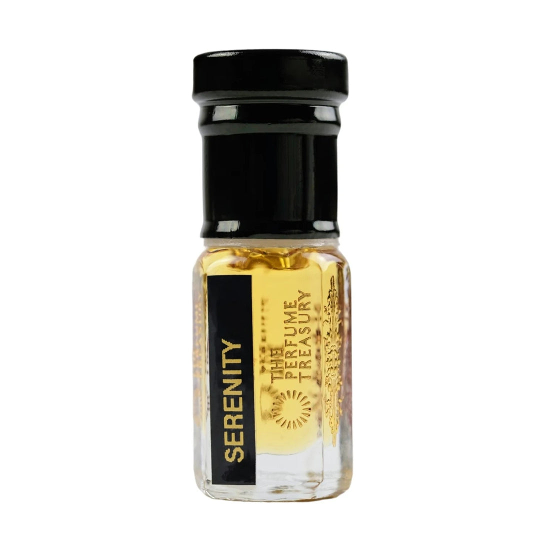 Serenity perfume oil by The Perfume Treasury in a clear glass bottle with black cap and golden fragrance oil.