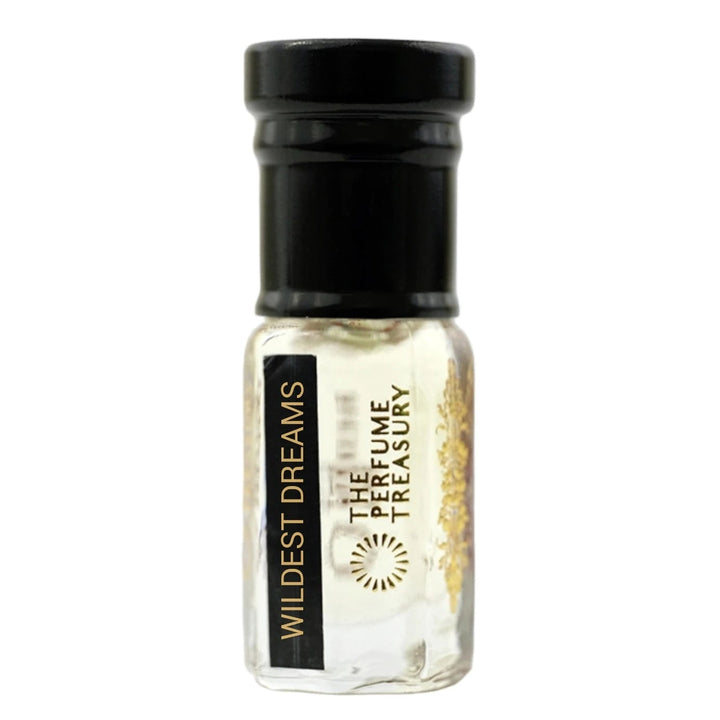 Small clear glass perfume oil bottle with black cap, Wildest Dreams 3ml attar perfume oil by The Perfume Treasury, clear to lightly tinted smooth fragrance oil on white background.